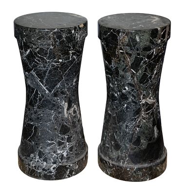Marble Pedestals A pair of black and white brecciated marble cylindrical pedestals having 