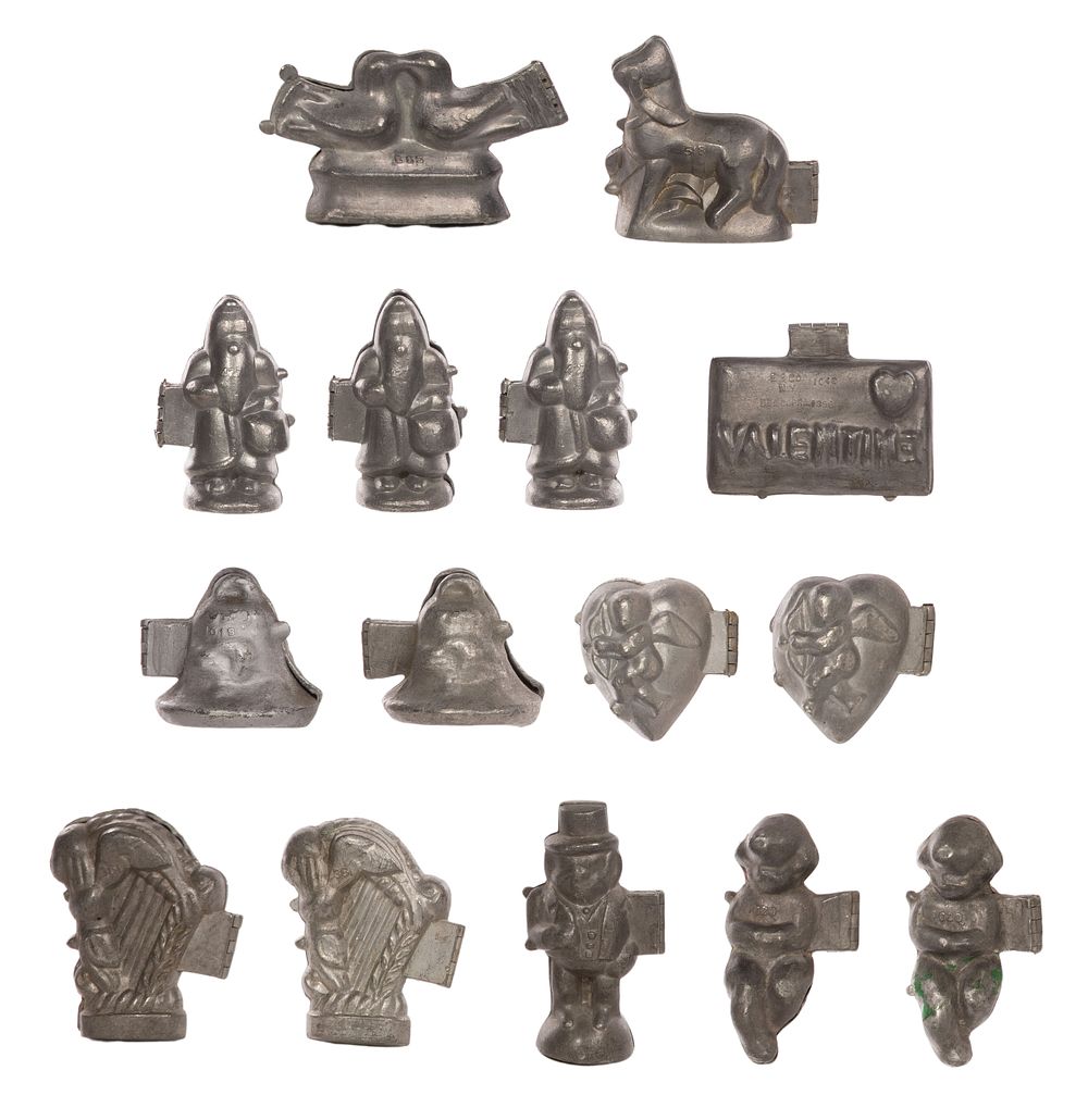 Lot 474: Pewter Holiday Themed Chocolate and Ice Cream Molds