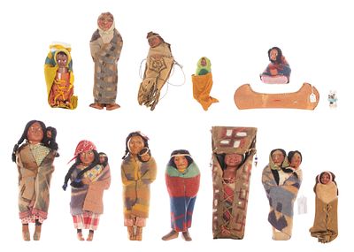 Native American Skookum Doll Assortment (14) total items including (12) dolls; together with a 