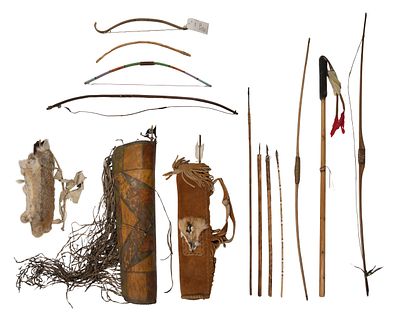 Native American Bow and Arrow Assortment Various bows, animal hide quivers, arrows, a parfleche 