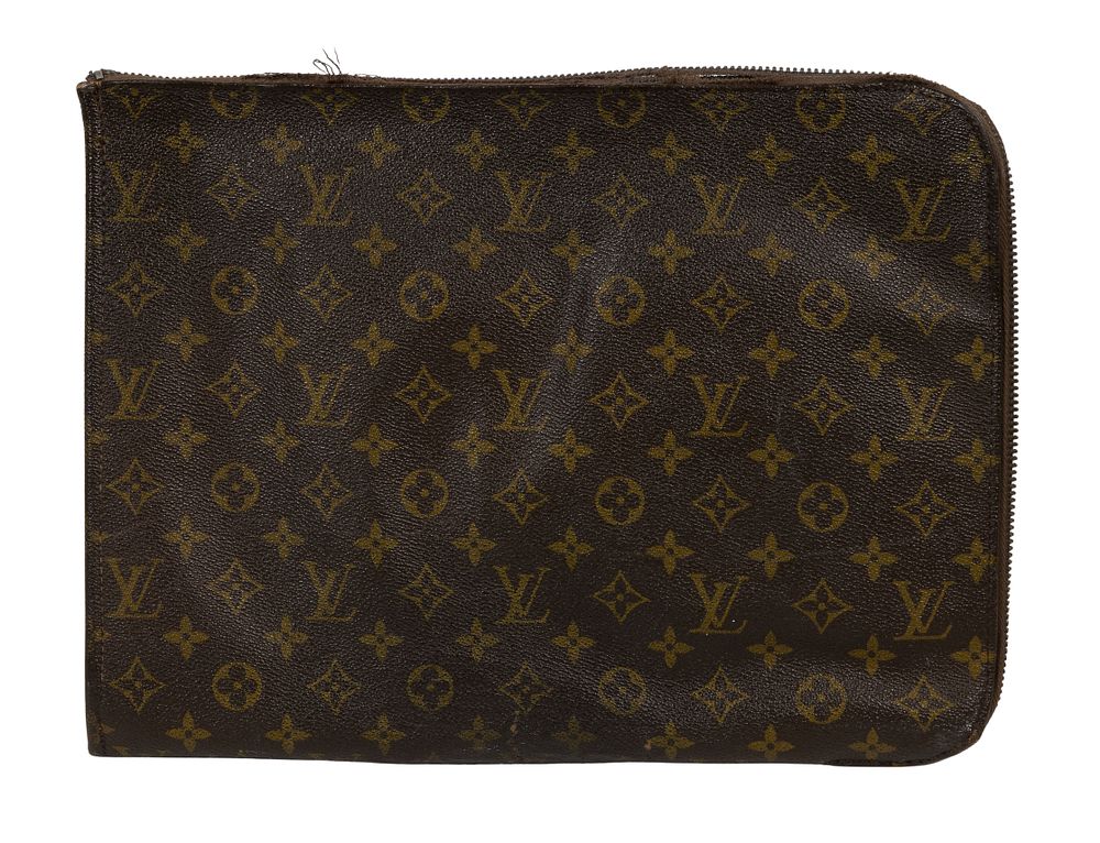 Louis Vuitton - Louis Vuitton Portfolio 
Monogram canvas having zipper on two sides 
Property 