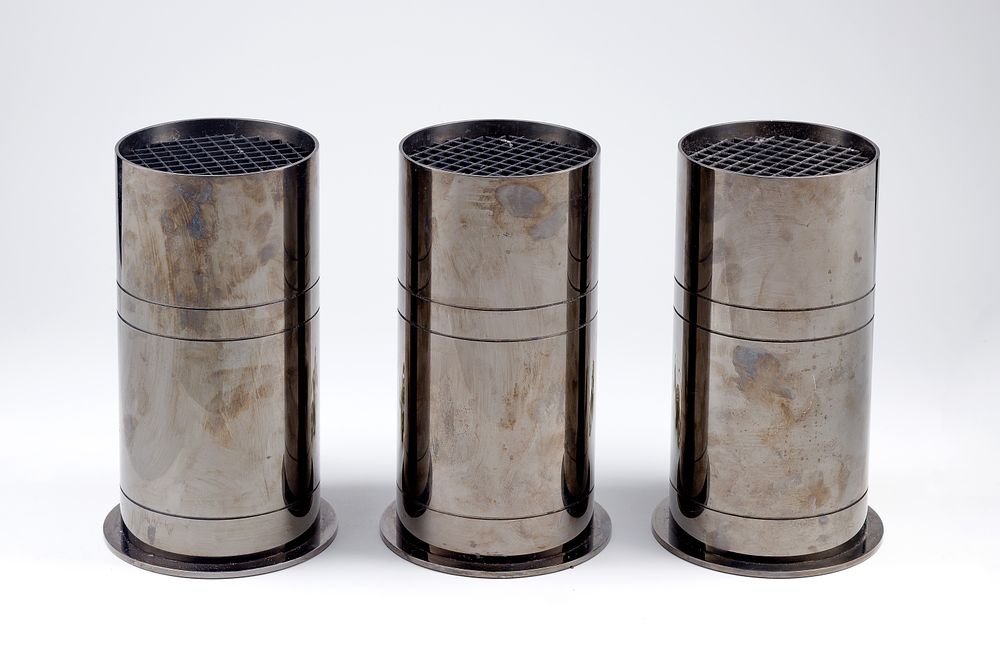 Lot 310: Karl Springer Gun Metal Cylindrical Up Light Lamp Collection
