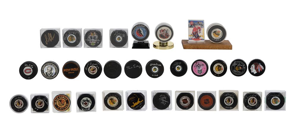 Lot 291: Chicago Blackhawks Signed Hockey Puck Assortment
