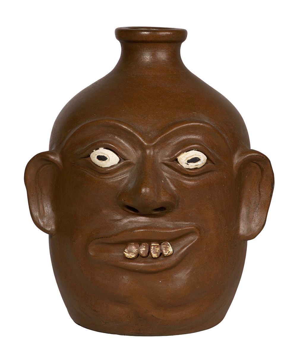 Lot 265: Ugly Face Pottery Jug