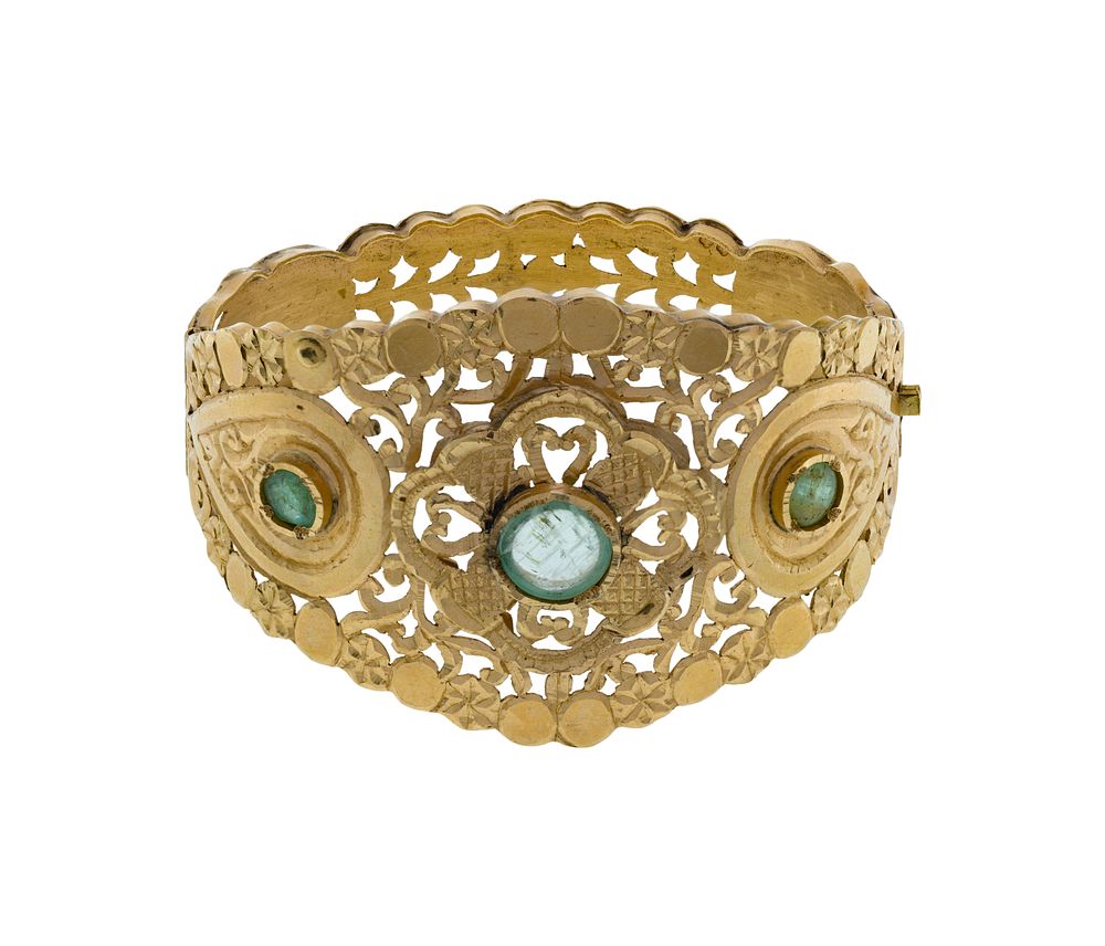 Lot 310: 18k Yellow Gold and Emerald Hinged Bangle Bracelet