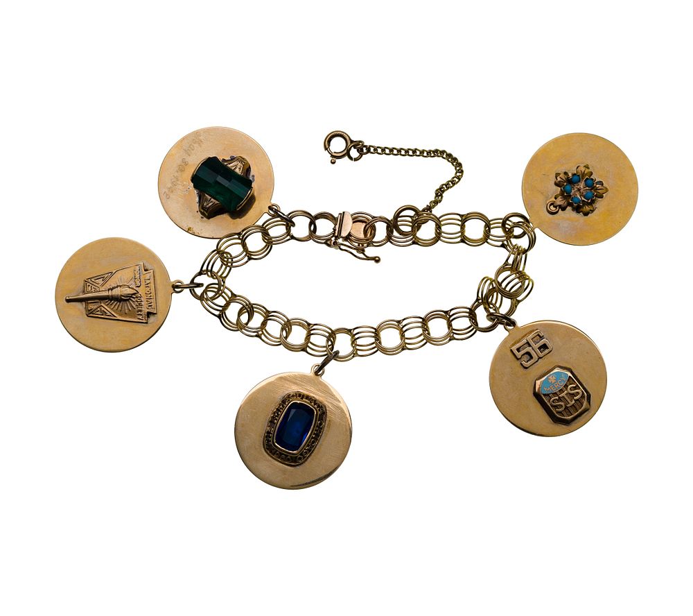 Lot 324: 14k Yellow Gold Charm Bracelet