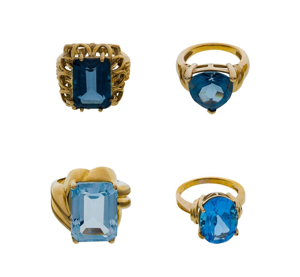 Lot 408: 10k Yellow Gold and Blue Topaz Ring Assortment