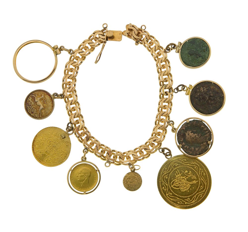 Lot 396: Mixed Gold Charm Bracelet