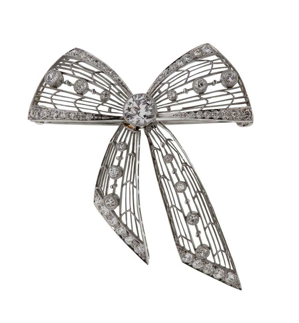 Lot 552: Platinum and Diamond Bow Brooch