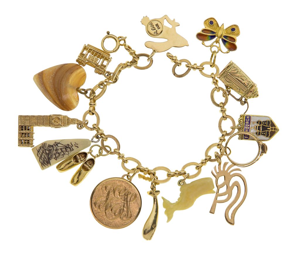 Lot 433: 14k Yellow Gold Bracelet Having Mixed Gold Charms