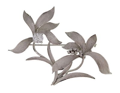 14k White Gold and Diamond Floral Brooch A double flowered brooch, one flower having center 