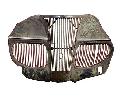Ford - Ford Metal Grille A curved, three-piece grill having straight vertical bars and script 