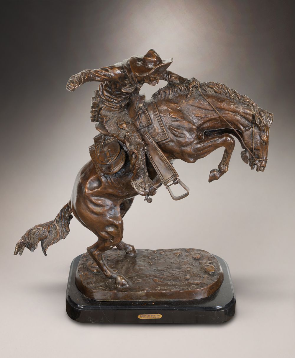 Lot 205: After Frederic Remington (American, 1861-1909) 'Bronco Buster' Bronze Sculpture