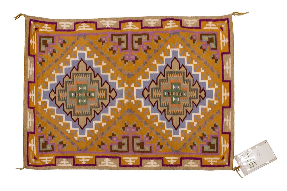 Lot 286: Ruth Ann Tracey (Navajo / Dine, 20th Century) 'Burnt Water' Wool Rug