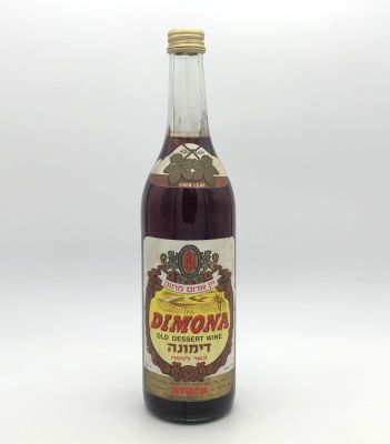 Dimona - Red Sweet Wine - Stock. Dimona - red sweet wine. Produced and bottled by W.E.S.T for 