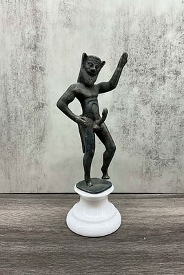Erotic Satyr On Granite Plinth. Neoclassical satyr cabinet statue, cast iron with a carved 