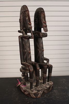 Fine Dogon People, Primordial Couple Carving. Size: 25.5"H x 9.5"W x 9"D Condition: Shipping: 