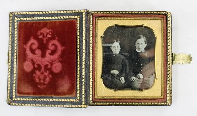 Daguerreotype In Leather Bound Faux Book. Beautifully crisp daguerreotype of two children in a 
