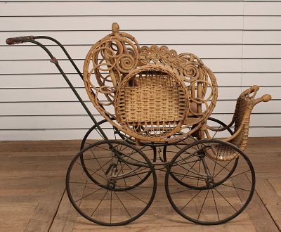 Antique Victorian Style Wicker Doll Pram. Size: 27"H x 33"W x 16"D Condition: Shipping: There 