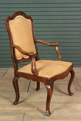 19th Century French Armchair. A 19th century French open arm chair with shaped back and cabriole 