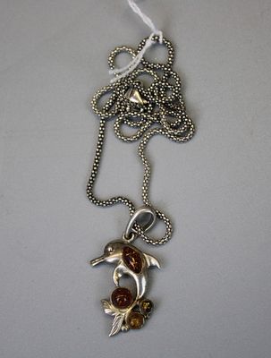 Silver Dolphin Amber Set Pendant on Silver Chain