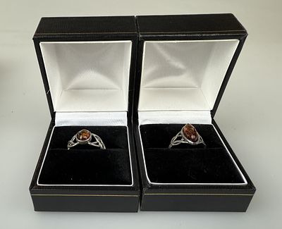 Two Silver Amber Set Celtic Style Rings