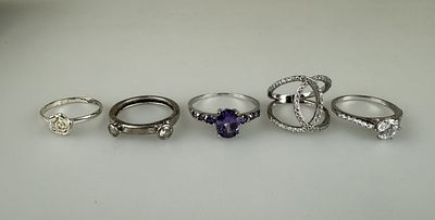 Five Silver Stone Set Rings