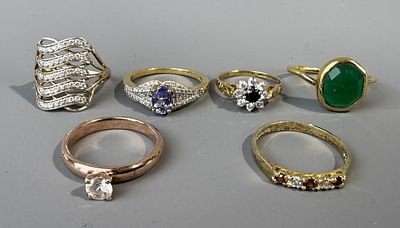 Six Gold on Silver Stone Set Rings.