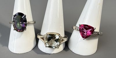 Three Silver Stone Set Rings.