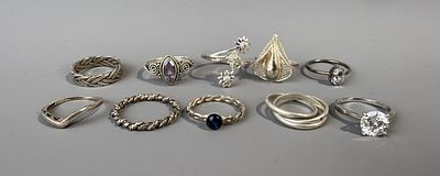 Ten Silver Rings.