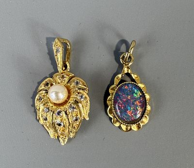 Two Gold on Silver Stone Set Pendants