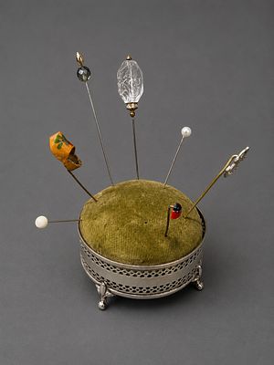 Hallmarked Silver Pin Cushion with a Selection of Pins Approx Silver Weight 30g