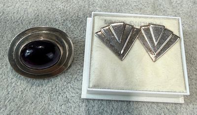 Silver Brooch Set with A Cabochon, together with A Pair of Art Deco Style Silver Earrings