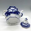 Antique Porcelain Flow Blue Teapot with Lid. Blue floral design over octagon paneled shape. Lid Image - 2