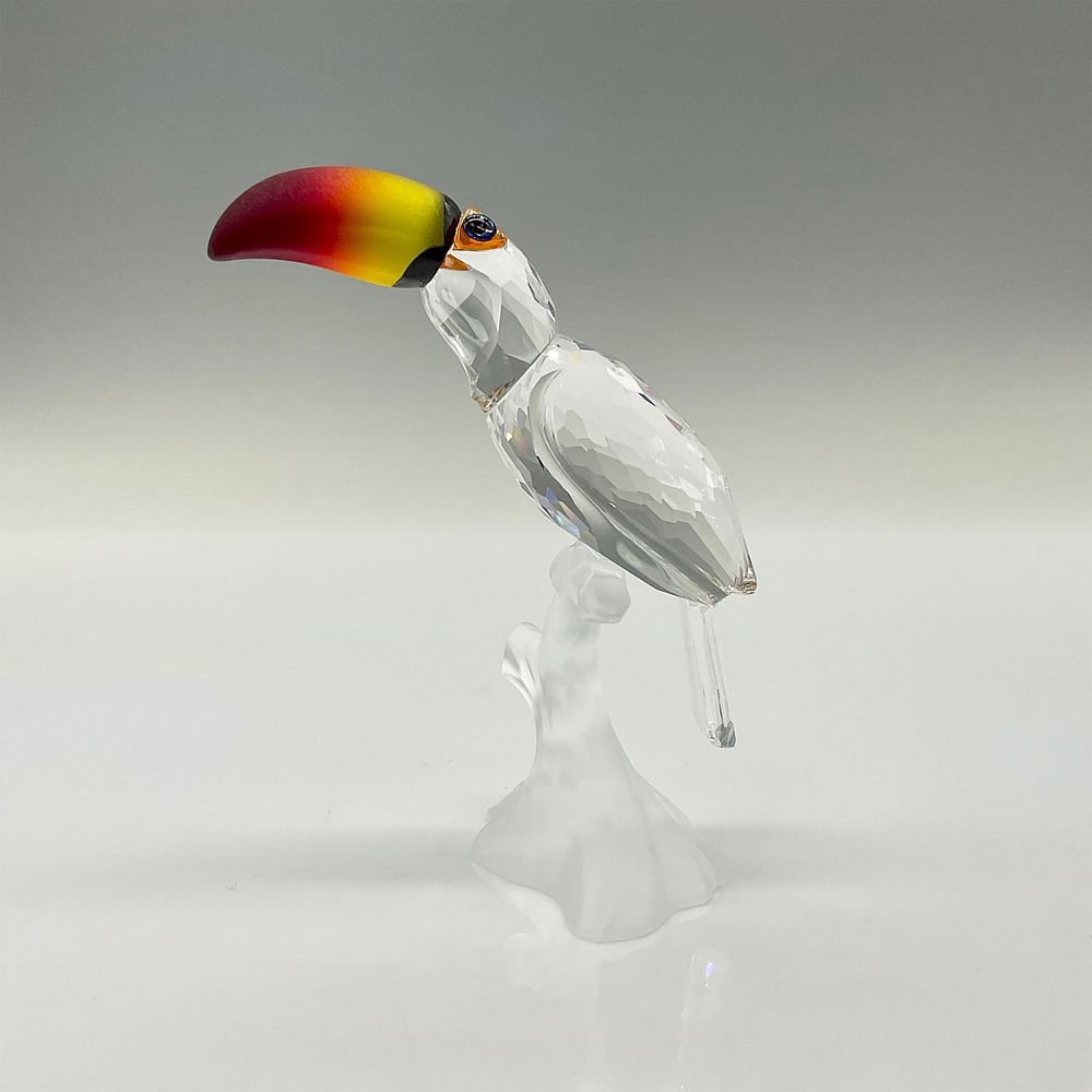 Swarovski Crystal Figurine, Toucan On A Branch. The Toucan is made of clear crystal and sits on 