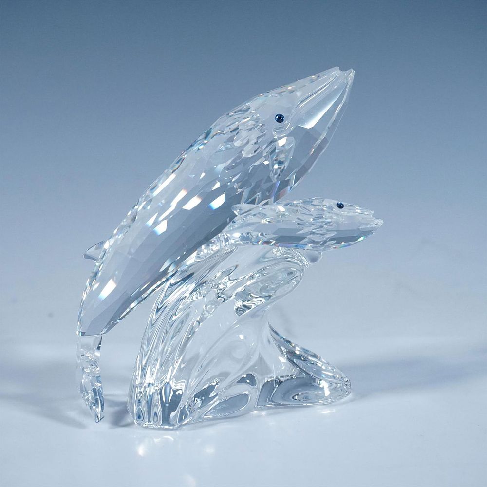 Swarovski Crystal SCS Whales Figurine, Care For Me. A clear faceted sculpture of a mother whale 