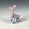 Restful Mouse 1005882 - Lladro Porcelain Figurine. A glossy figure of a child in a mouse costume Image - 1