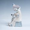 Pierrot with Concertina 1005279 - Lladro Porcelain Figurine. Adorable Pierrot depicted playing Image - 1