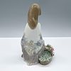 Flower Song 1007607 - Lladro Porcelain Figurine. Glossy porcelain, depicting a woman with a Image - 1