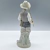 Going Fishing 1004809 - Lladro Porcelain Figurine. Glossy porcelain. Features a cute young boy Image - 1