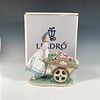 Loves Tender Tokens 1006521 - Lladro Porcelain Figurine. A glossy sculpture of a girl pushing a Image - 3