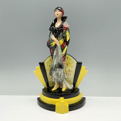 Peggy Davies Ceramics Figurine, Celebration. Hand painted of a vibrant porcelain figurine of a