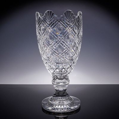 Waterford Crystal Footed Vase. This elegant Waterford crystal footed vase features a deeply cut
