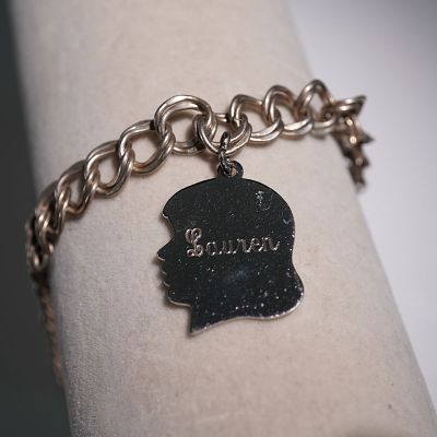 Sterling Silver Charm Bracelet with Silhouette Lauren Pendant. This vintage sterling silver