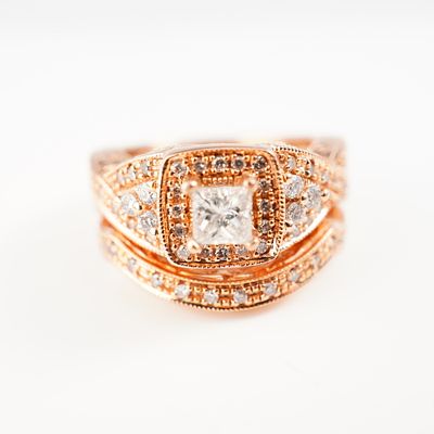 14kt Blush Rose Gold Diamond Bridal Set with Intricate Detailing. This exquisite two-piece