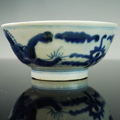 Antique Chinese Blue and White Dragon Porcelain Bowl. A porcelain bowl decorated in underglaze