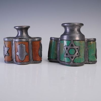 2pc Modernist Judaica Vessels Featuring Star of David, Hamsa & Flame Motifs. A striking pair of
