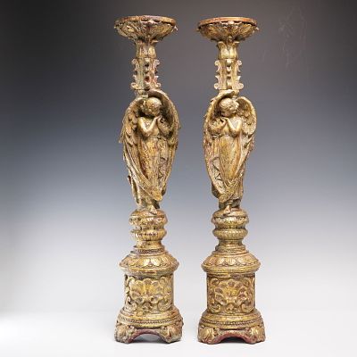 Pair of Large Gilded Angel Motif Candlestick Holders. Pair of elaborately carved tall