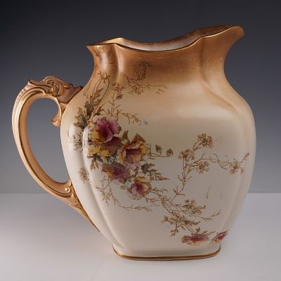 Doulton Burslem Water Jug with Floral Gilt Design. This elegant 10.5-inch water jug by Doulton