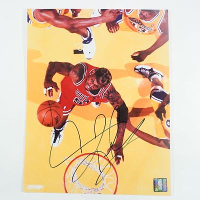 Dennis Rodman Signed Chicago Bulls Photograph with COA. This auction features a signed